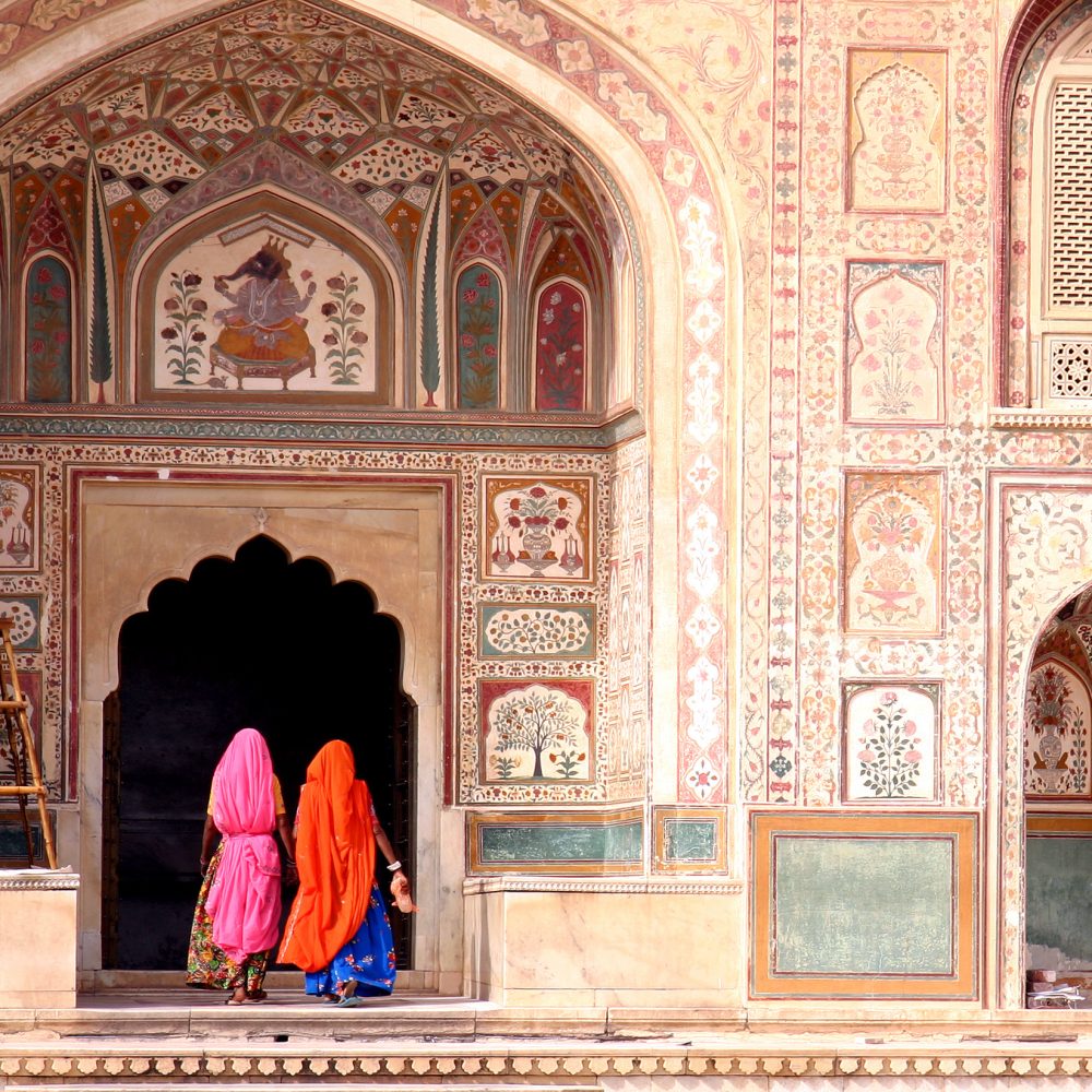 Two women walking in the Amber Fort, Jaipur